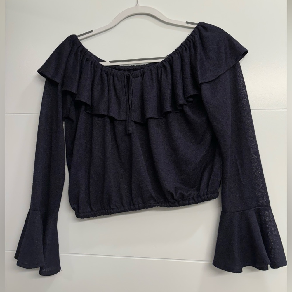 Off-the-shoulder navy top with bell sleeves